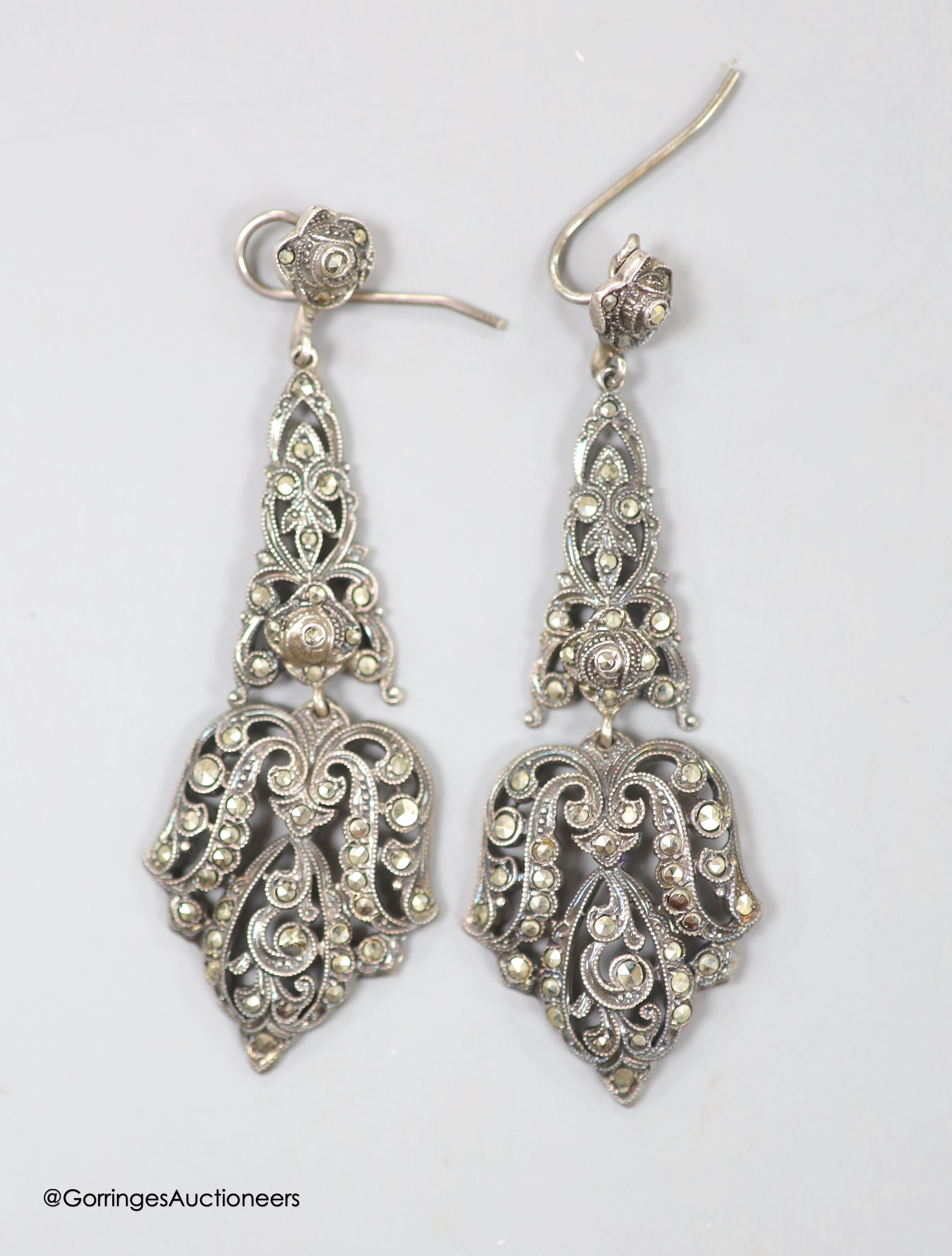 A pair of white metal and marcasite set drop earrings, 63mm.